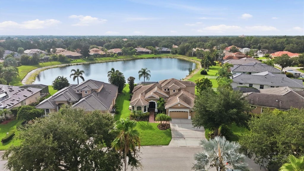 Photo of 6915 Honeysuckle Trail, Lakewood Ranch, FL 34202 (MLS # A4700527)