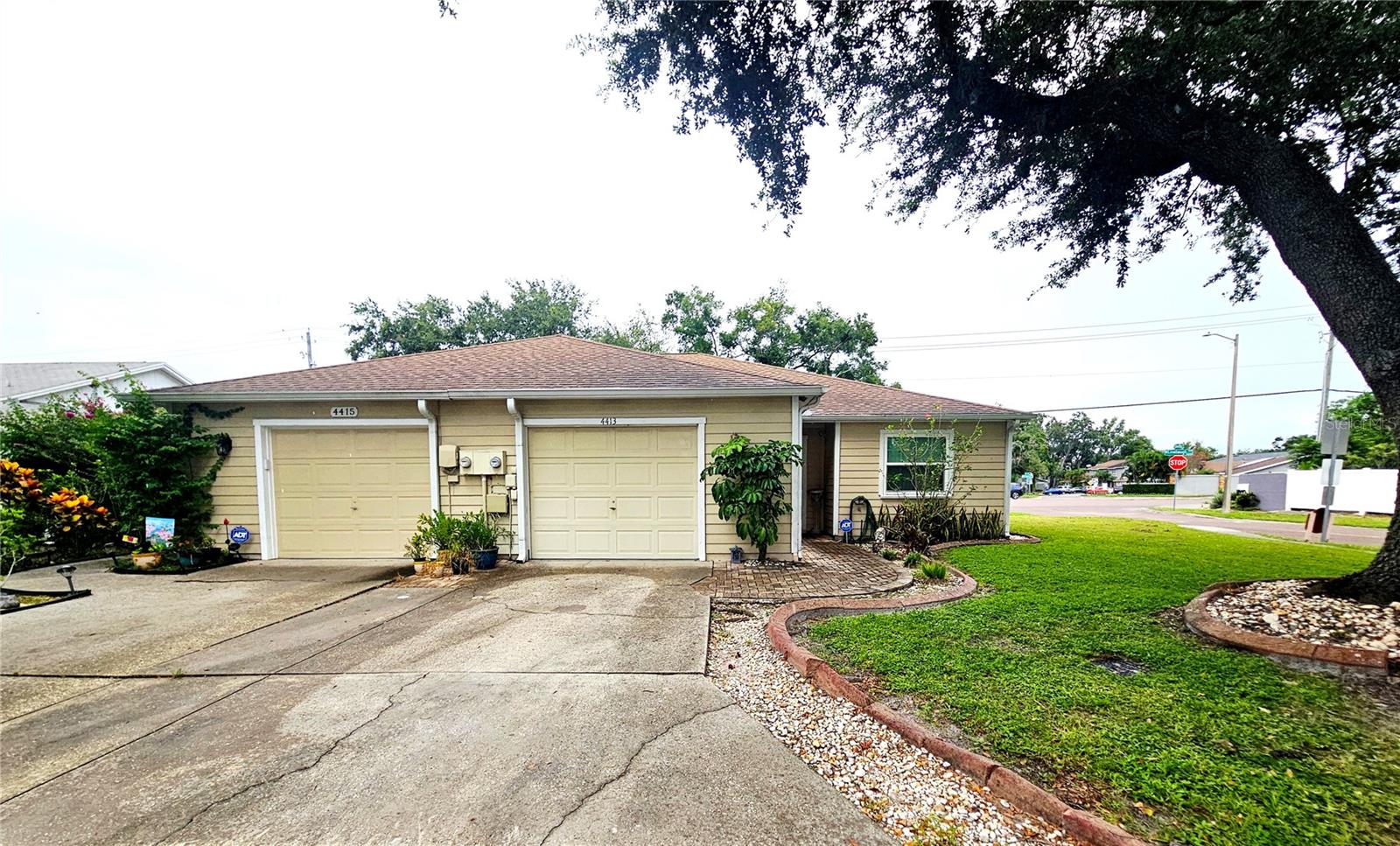 Rare find near the Carrollwood area! This charming villa offers 2 bedrooms, 2 baths, and a formal dining area. The spacious yard is perfect for outdoor enjoyment. Inside, you'll find hurricane impact windows and doors for peace of mind, a cozy fireplace, and a screened lanai ideal for relaxing or entertaining. Conveniently located with easy access to various restaurants, shopping, hospitals, Raymond James Stadium, Tampa International Airport and more.