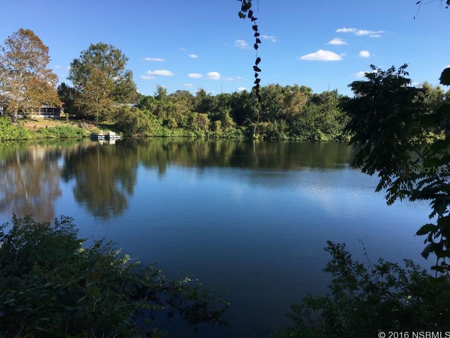Nice elevated lot on small pond for homesite in close proximity to shops and grocery near down town Deltona. Located in the lovely quiet Deltona Lakes subdivision.; Cleared: No ;Water: Available at Site
