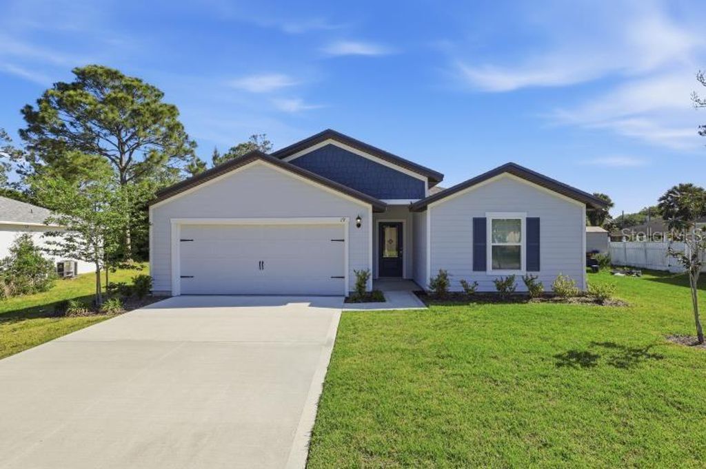Photo of 19 Pineapple Drive, Palm Coast, FL 32164 (MLS # FC317890)
