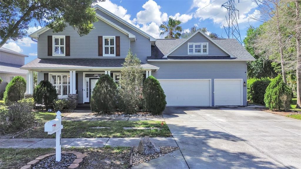 Photo of 1083 Misty Hollow Lane, Tarpon Springs, FL 34688 (MLS # TB8494023)