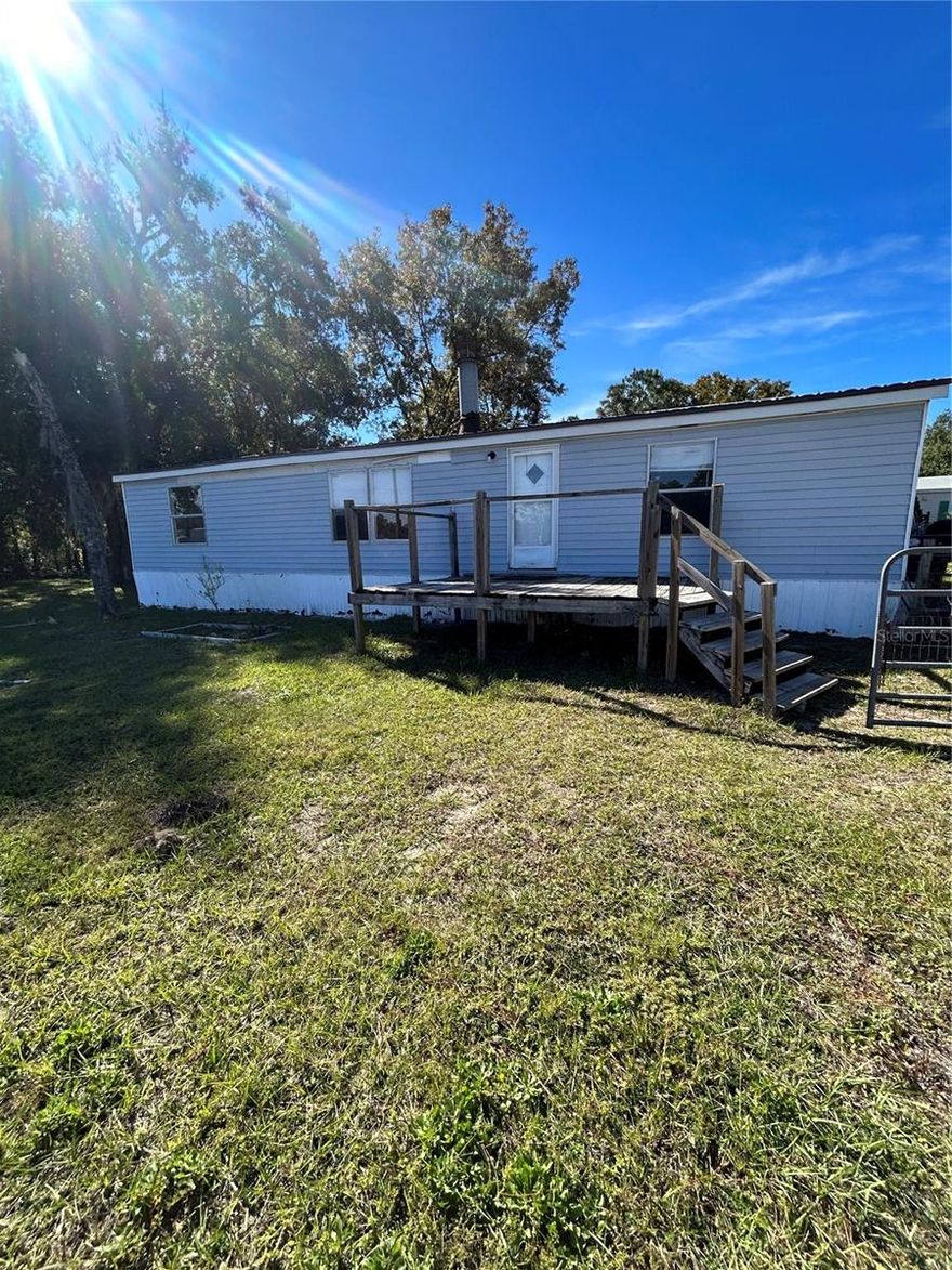 This 3-bedroom, 2-bath mobile home in a quiet Bronson neighborhood features a spacious layout with an open living area and split floor plan. Conveniently located near schools, parks, and just a short drive to Gainesville.