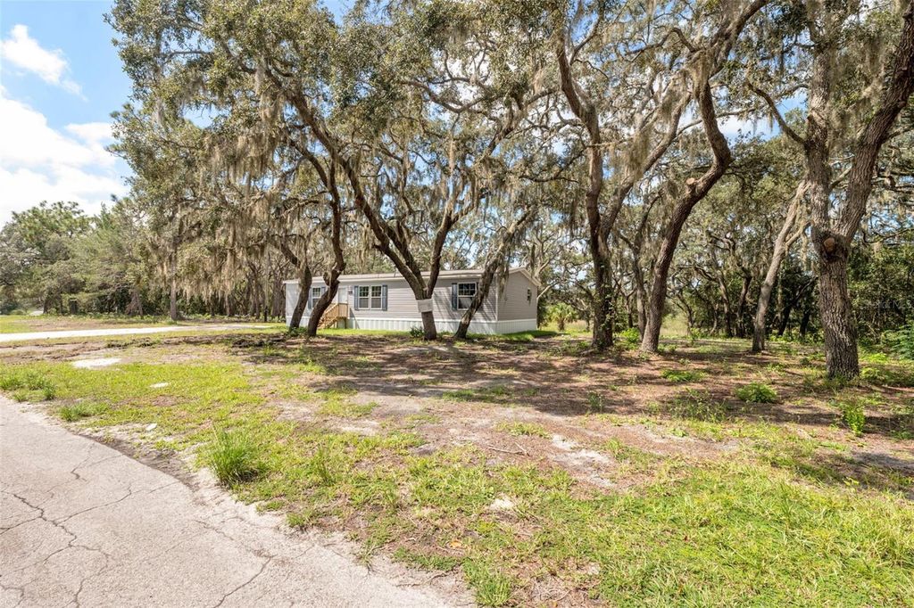 Photo of 18223 Long Lake Drive, Hudson, FL 34667 (MLS # TB8433989)