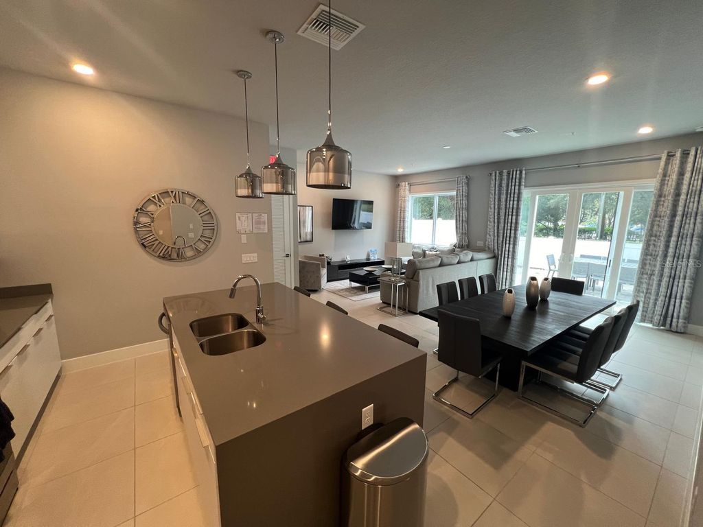 Photo of 7770 Sandy Ridge Drive #126, Reunion, FL 34747 (MLS # O6386647)