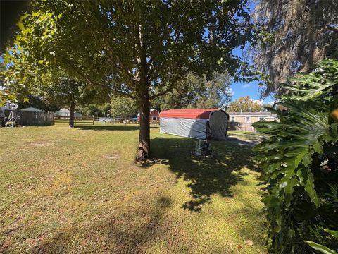 Photo of 444 Quail St, Lady Lake, FL 32159 (MLS # OM712318)