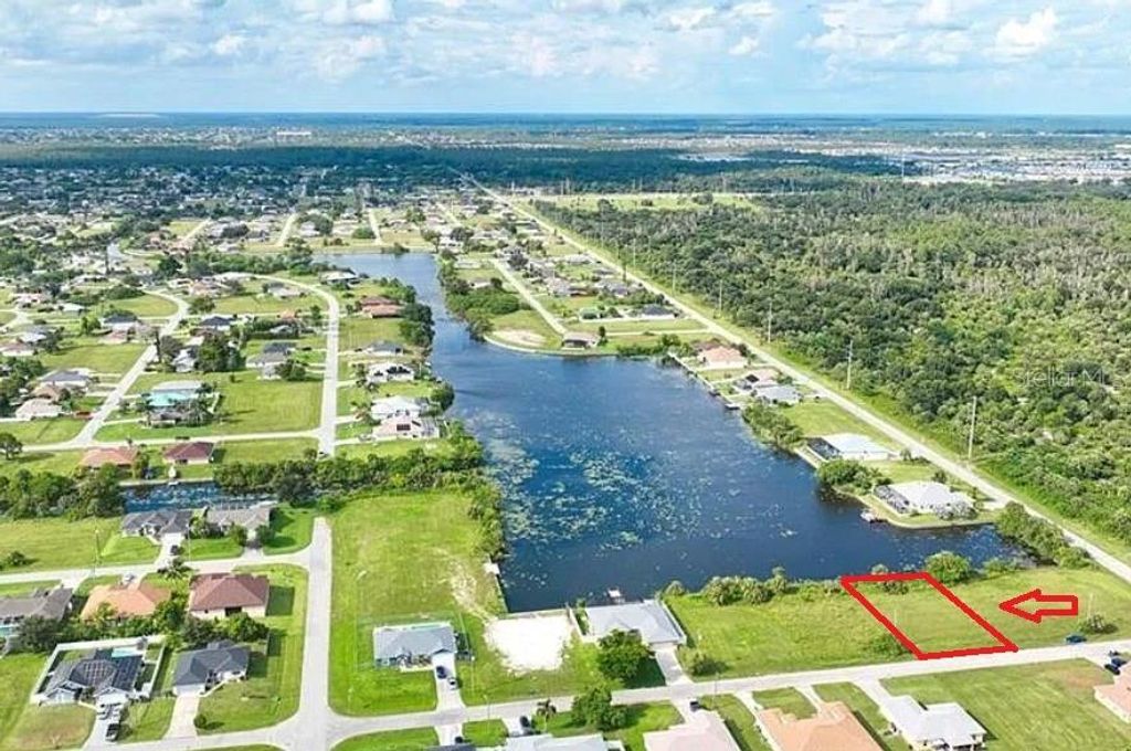 Photo of 2321 NE 17th Street, Cape Coral, FL 33909 (MLS # O6292066)