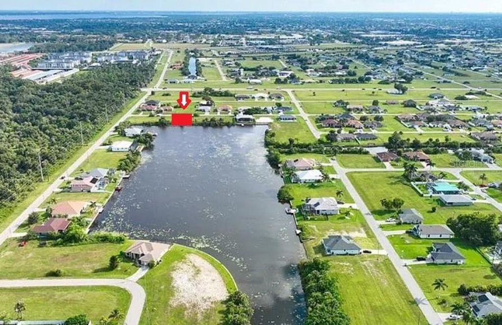 Photo of 2321 NE 17th Street, Cape Coral, FL 33909 (MLS # O6292066)