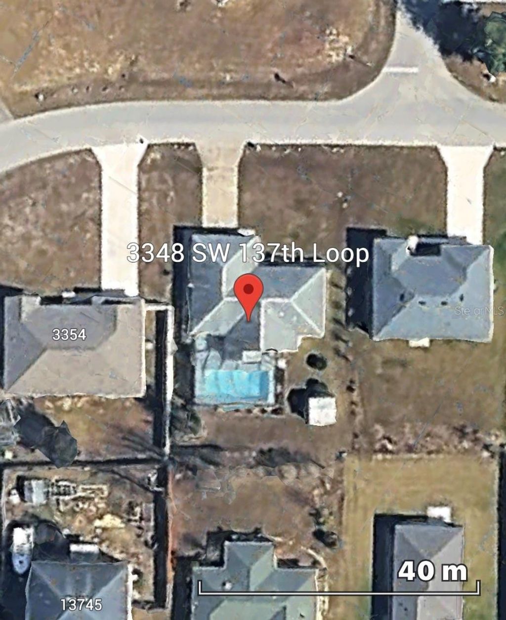 Photo of 3348 SW 137th Loop, Ocala, FL 34473 (MLS # OM715033)