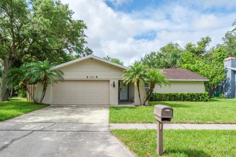 Photo of 1313 Whisper Drive, Largo, FL 33770 (MLS # TB8515731)