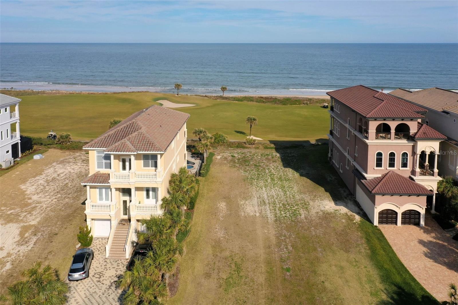 Your search is over- build your dream house on this breathtaking oceanfront home site on the area’s most sought-after cul-de-sac, Hammock Beach Court! Enjoy the best of both worlds- this magnificent property offers jaw-dropping views of the Atlantic Ocean, as well sweeping vistas of the famous 9th fairway of the Jack Nicklaus Signature Ocean Course. You can’t find a view better than this anywhere on Florida’s East Coast! This is just one of 7 total home sites on prestigious Hammock Beach Ct.- this may be your last chance to obtain this highly valued address! Desirable “Discovery Center” gated community offers neighborhood clubhouse with pool, private access to the beach for residents. No timeline to build. HOA handles yard maintenance, including mowing, irrigation and landscaping- your days of yardwork are over! Seize this once-in-a-lifetime opportunity before it’s gone- don’t delay!