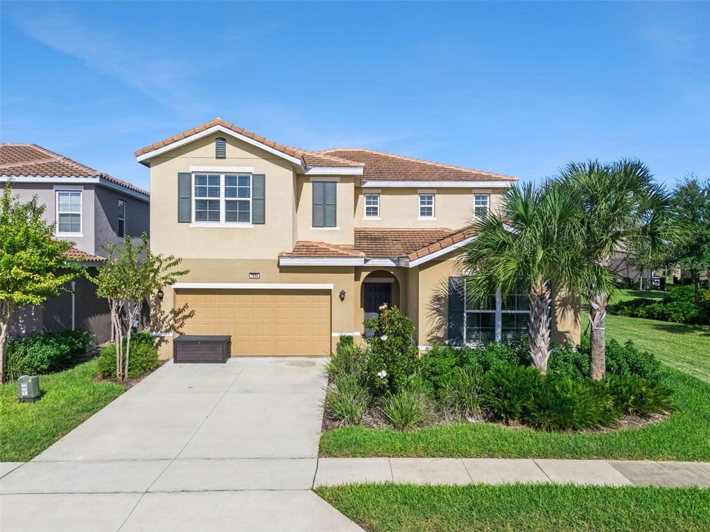 Photo of 7646 Oakmoss Loop, Davenport, FL 33837 (MLS # O6452530)