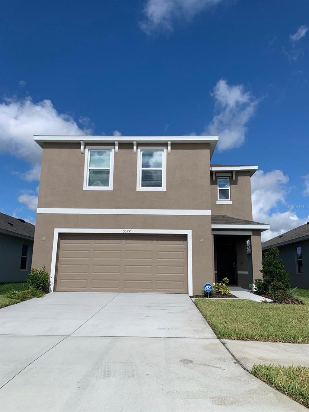 Photo of 5527 Warrington Town Path, Wesley Chapel, FL 33545 (MLS # TB8436923)