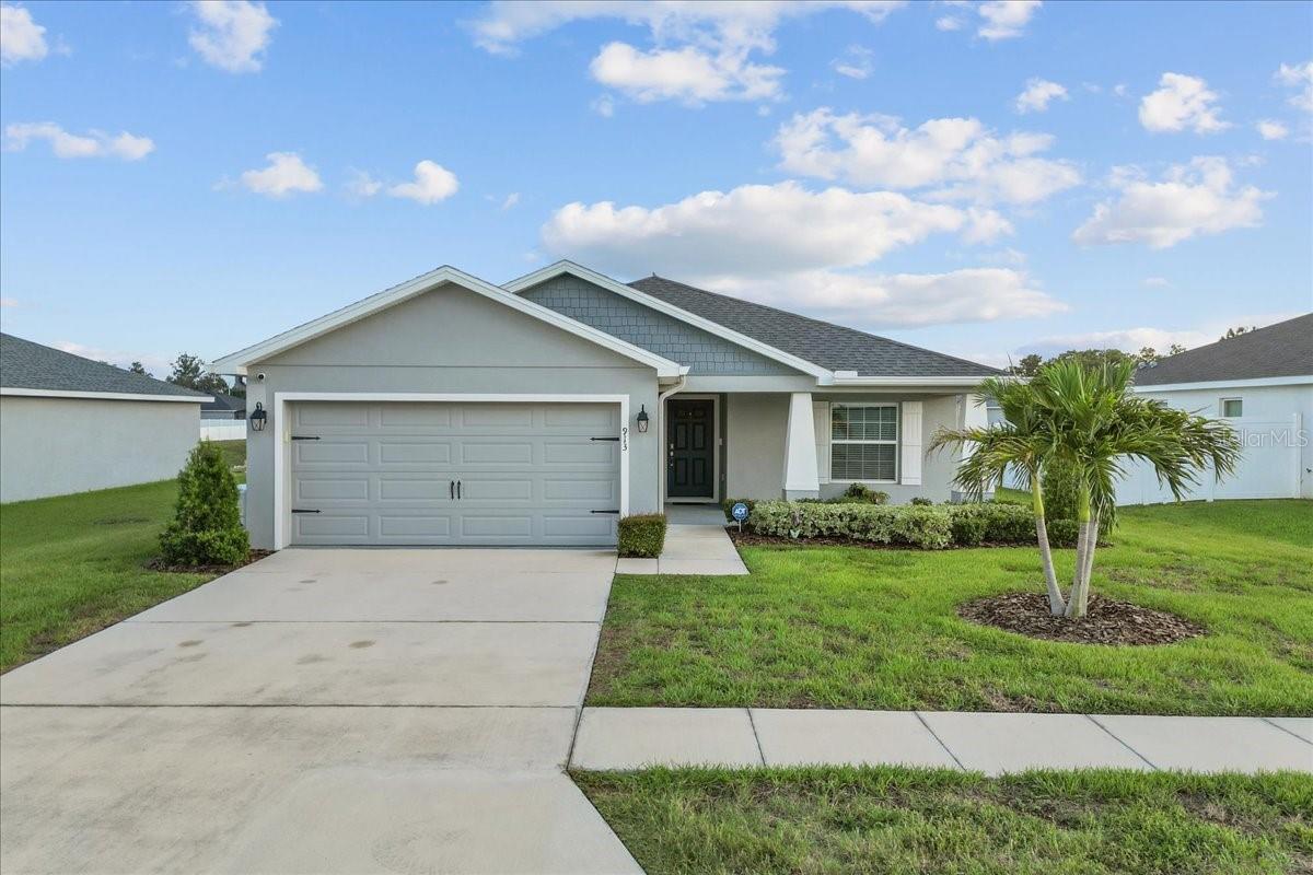 Discover your forever home at 913 Inverness Way, a meticulously maintained 3-bedroom, 2-bathroom gem in Lake Alfred. This home boasts luxury vinyl planking that’s waterproof throughout, paid-off solar panels, a newer whole-house generator, and an Aquis whole-house water conditioner for ultimate convenience. All of these features are complemented by Tru Grit floor coatings on the lanai and garage. This exquisite property features an open-concept layout with abundant natural light, an updated kitchen, stainless steel appliances, and a breakfast bar perfect for entertaining. Nestled in a quiet neighborhood near theme parks, hiking and biking trails, lakes, and playgrounds, it offers seamless access to Central Florida’s attractions while maintaining a serene lifestyle. No detail was overlooked in this stunning home, ready for its next owner to make lasting memories!