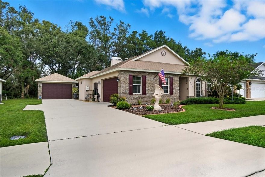 Welcome to Park Place, a small and quiet gated community with low HOA fees and no CDD fees. This stunning 2016 custom-built 3-bedroom, 2-bathroom home blends timeless craftsmanship with modern comfort, offering versatile spaces and thoughtful upgrades throughout.
Step inside and be greeted by a custom 8ft glass entry door and master trim carpentry that flows throughout the home. The heart of the home is the spacious living room, highlighted by a rare brick gas fireplace and matching brick kitchen island, setting the tone for warmth and character. Solar tubes fill the space with natural light, while the open-concept kitchen showcases custom 43" cabinetry, top of the line stainless steel appliances, over/under cabinet lighting, a large walk-in pantry, and a breakfast nook with an upgraded oversized window.
The home features a formal dining room that easily transitions into a den, office, playroom, or even a 4th bedroom (builders original plans). The primary suite is a true retreat, complete with dual closets and a spa-inspired bathroom featuring a soaking tub, dual vanities with a makeup station, and a walk-in shower with built in corner seat. Functionality is a standout in this natural gas home. Providing endless hot water thanks to the tankless water heater. This home also has a whole-home water softener, and surround sound in the living room, primary suite, and screened lanai. Both the attached 2-car garage and detached garage offers 220-amp service and attic flooring for ample storage, along with an outlet for a generator to provide instant power during outages. The oversized driveway and additional detached garage provide room for vehicles, toys, or a dream workshop. Enjoy Florida living year-round on the screened lanai with brick flooring, perfect for relaxing or entertaining. There is a small storage shed located in the fenced in backyard as well for additional storage. The owners of this home left no  details out when building this home from the porcelain tile through out, custom lighted inlay accents, marble window sills and Hunter Douglas top/bottom opening cloth shades though out majority of the home. This home is the definition of pride of ownership, meticulously maintained and full of upgrades, and the new owner will be lucky to call it their own.