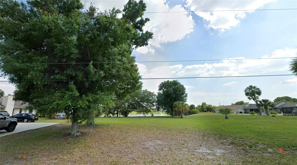 Photo of 210 Wylam Drive, Port Charlotte, FL 33954 (MLS # TB8562893)
