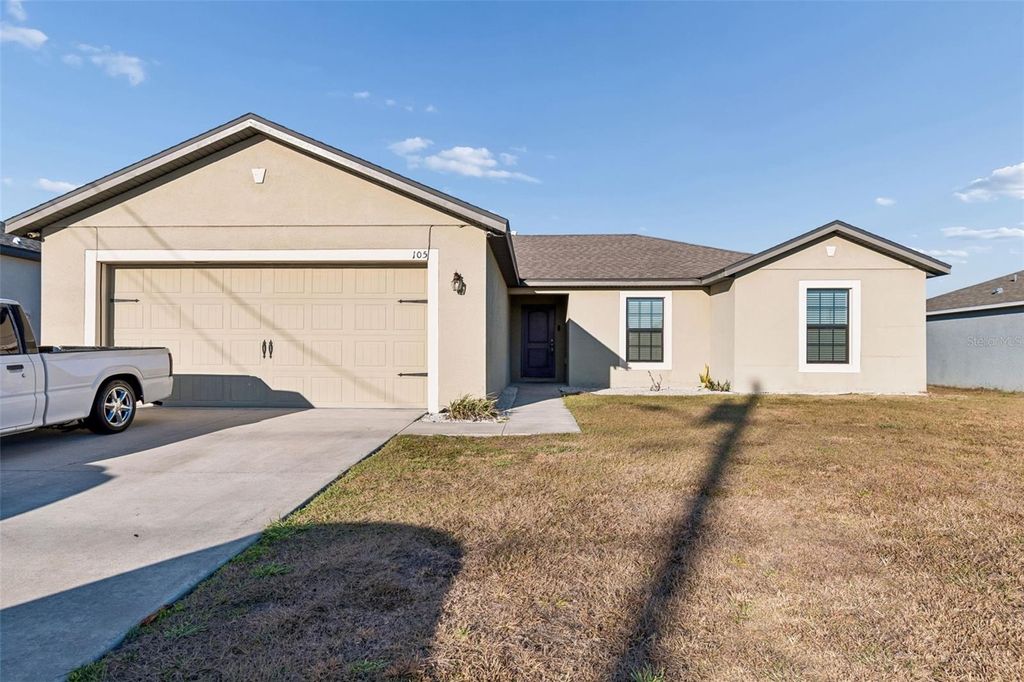 Photo of 105 Lily Lane, Poinciana, FL 34759 (MLS # S5143347)