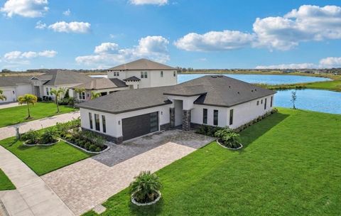 Photo of 224 Valencia Ridge Drive, Auburndale, FL 33823 (MLS # L4960032)