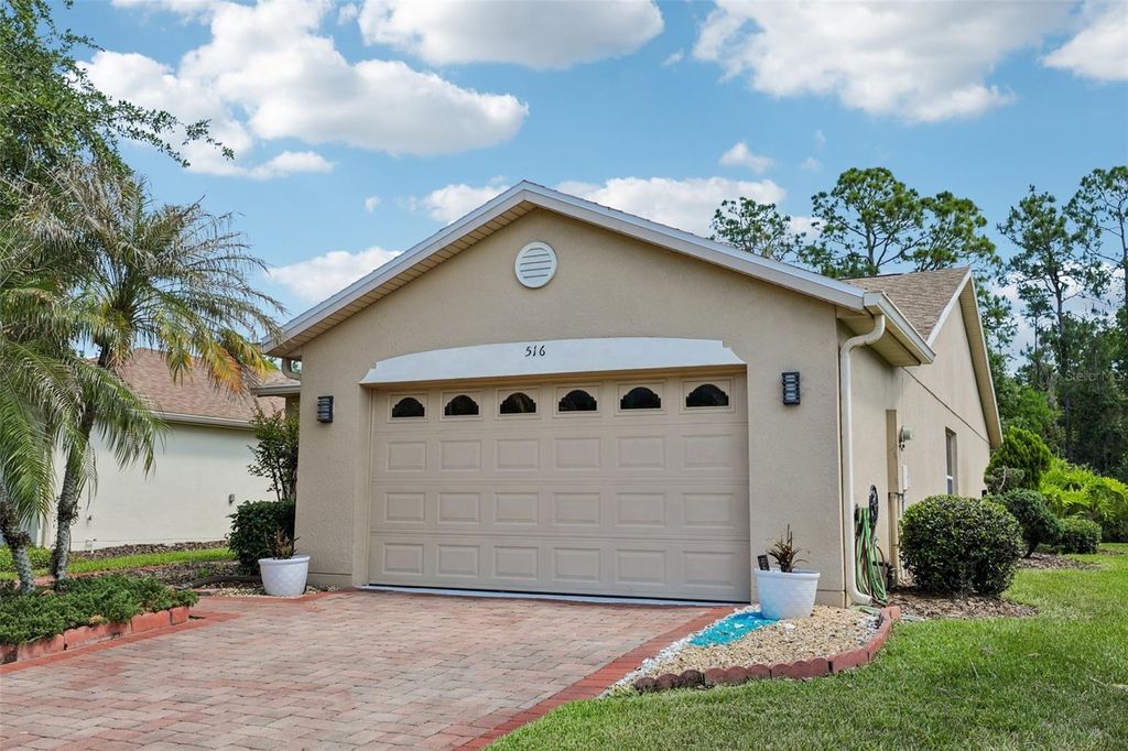 Photo of 516 Millifiora Lane, Poinciana, FL 34759 (MLS # P4938561)