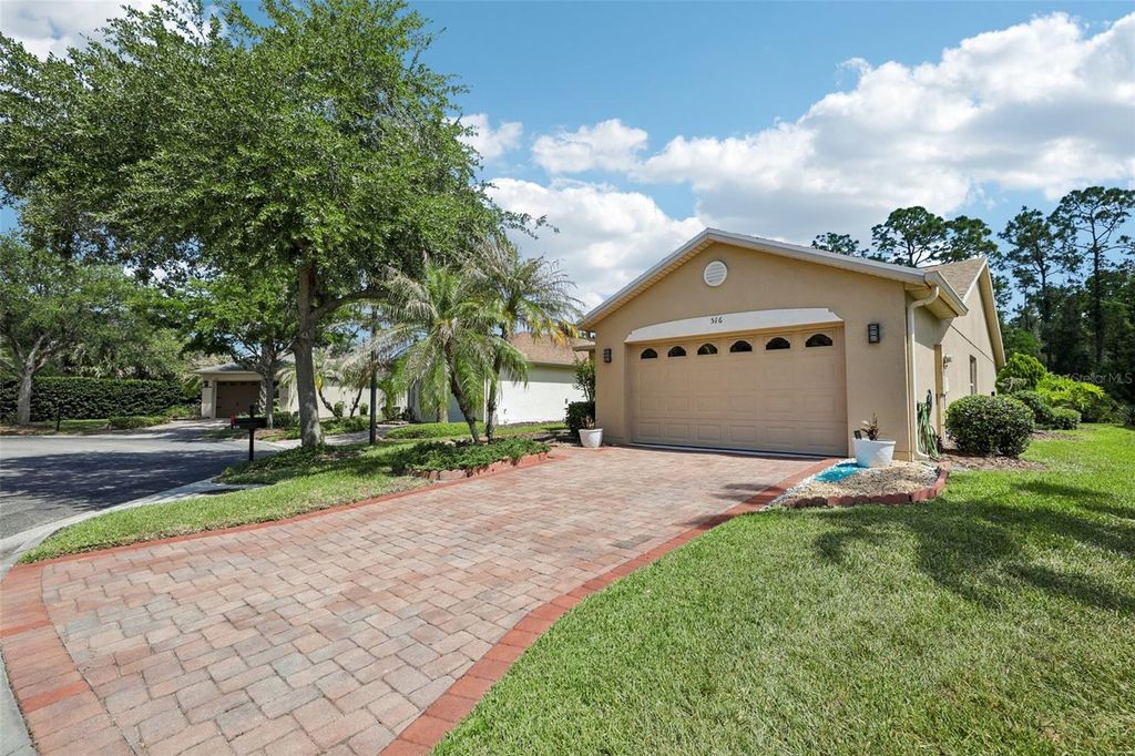 Photo of 516 Millifiora Lane, Poinciana, FL 34759 (MLS # P4938561)