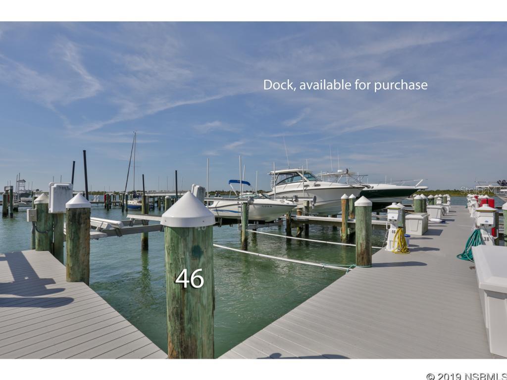 Intracoastal dock, 18 x 30, with lift, water and electric.
LIFT IS RATED AT 13,500 LBS. Dock #46 at Inlet Marina Villas Marina. Must be a homeowner of Minorca, Inlet Marina Villas, The Inlet or a Villa Way home. Ample parking at adjacent riverfront pavillion with bathrooms, BBQ, screened in picnic area. Marina was recently rebuilt/renovated with composite material, lighting, electric and water fixtures. Gated entrance, boardwalk, fish cleaning stations with water, lights. fishing pier. Close proximity to Ponce Inlet access to ocean fishing and boating. Great location with beautiful views of Intracoastal and Ponce Inlet Lighthouse.