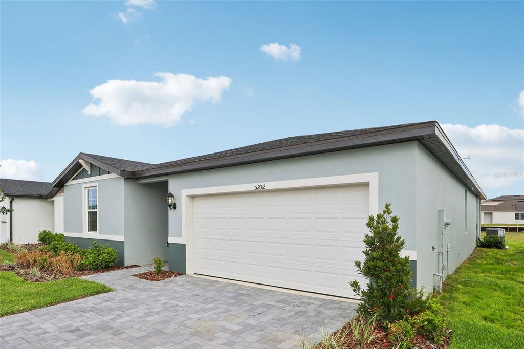 Photo of 5202 Green Belt Drive, Haines City, FL 33844 (MLS # O6369355)