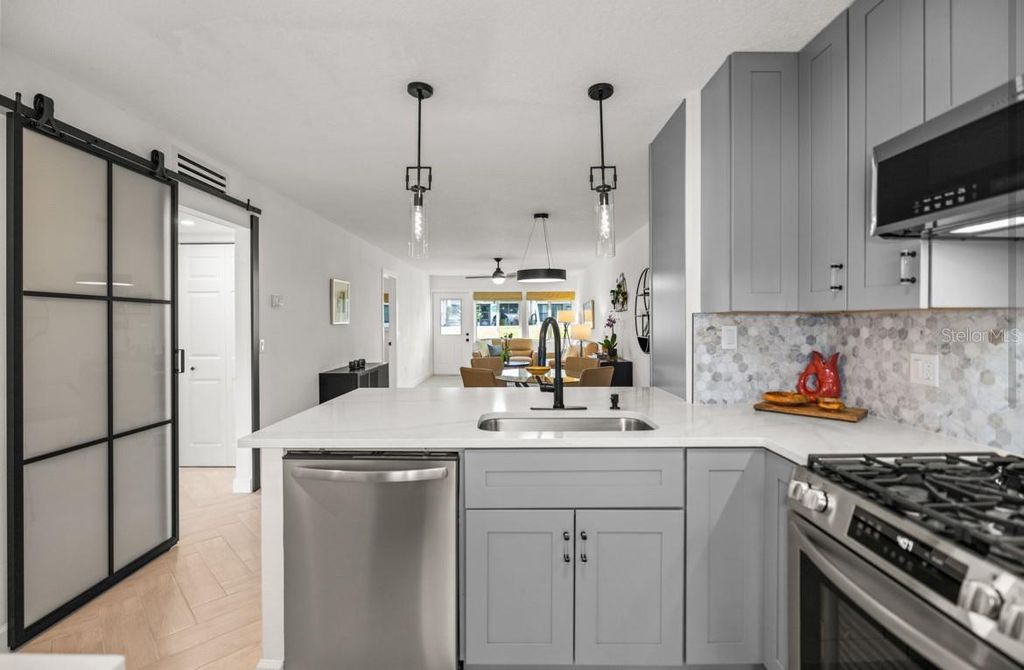 Photo of 1280 Mission Circle, Clearwater, FL 33759 (MLS # TB8463870)