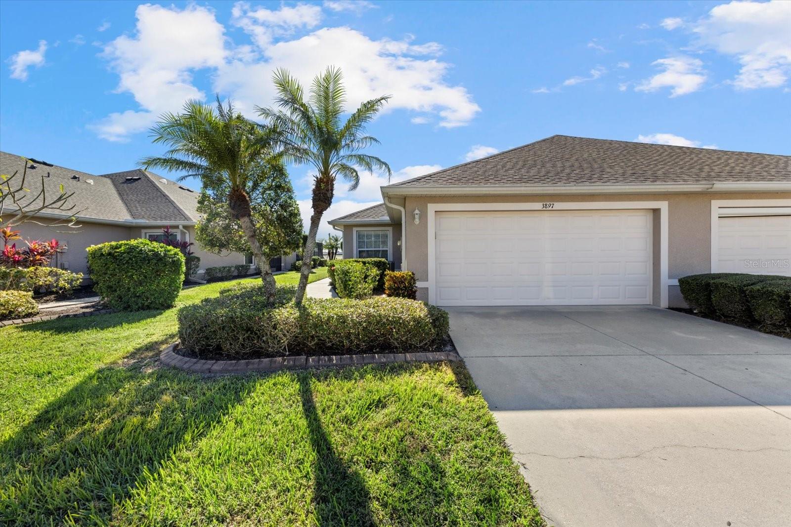 PRICE REDUCTION!! Meticulously cared for 3 bedroom, 2 bath villa in the highly desirable gated community of Villas of Sabal Trace, II that is ready to move right in and start enjoying life. As you approach the villa's screened entrance way you notice the beautiful landscaping and attention to detail. When you enter the villa, the openness and cathedral ceilings invite you in. The living room, kitchen, dinette, hallways and bathrooms flooring are all a neutral ceramic tile. The color scheme is also a neutral consistent color adding to the ease of decorating. The kitchen has a breakfast bar, closet pantry, lite wood cabinets, ample counter space, all for the chef in the family. The living room opens onto the covered and screened lanai. The master bedroom with en-suite bath has a walk-in closet and a single closet as well as a linen closet. The bath has a double sink vanity and walk-in shower. The split floor plan offers privacy to the guest bedroom and second bath. The guest bath has a tub/shower combination. The villa has a bonus room that is actually a third bedroom. Or can be used as an office, den or studio. The bedrooms and bonus room have carpet. The villa has an inside laundry room with full size washer and dryer as well as a utility closet. The villa opens by slider from the living room or by a door from the master bedroom. The lanai has a covered and screened are that opens onto the full extended screened lanai. This area perfect for relaxing and enjoying the wonderful FL weather and lifestyle. The community has a clubhouse with a fitness room, game room, social area but the main thing is the large, heated pool and sun deck. All of this located close to shopping, restaurants, golf courses, local beaches, world class fishing, spring baseball training facilities and stadiums, close to multiple airports for ease of travel and other area amenities.