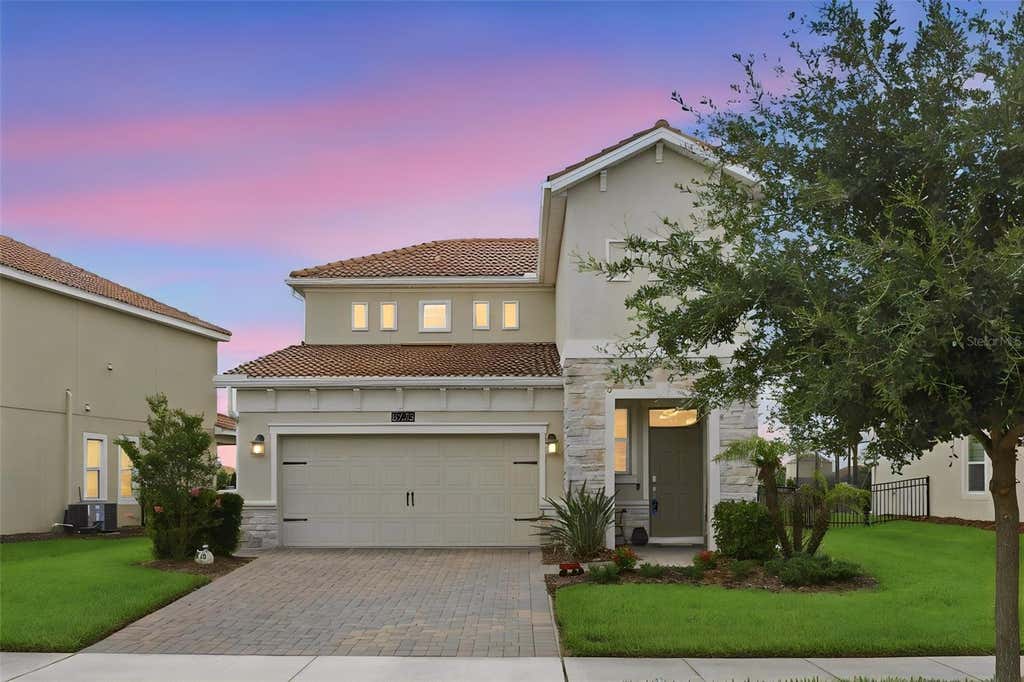 Photo of 8728 Pacific Dunes Drive, Davenport, FL 33896 (MLS # O6422531)