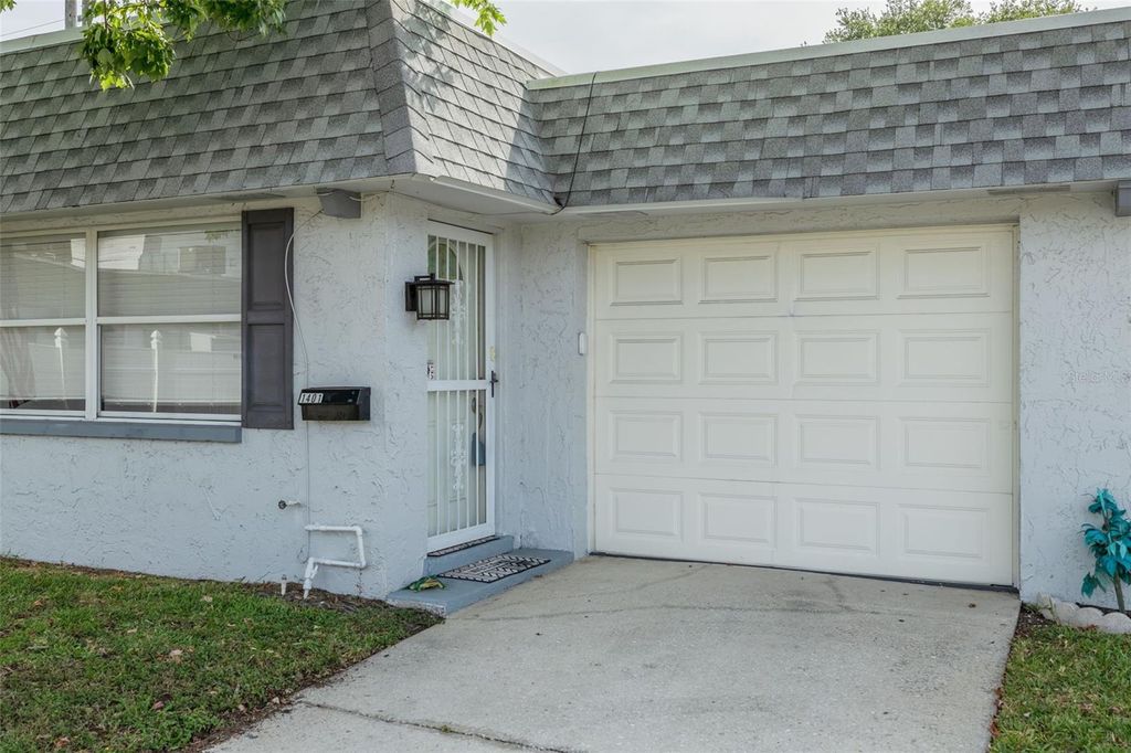 Photo of 1401 Cara Drive #1401, Largo, FL 33771 (MLS # TB8505811)