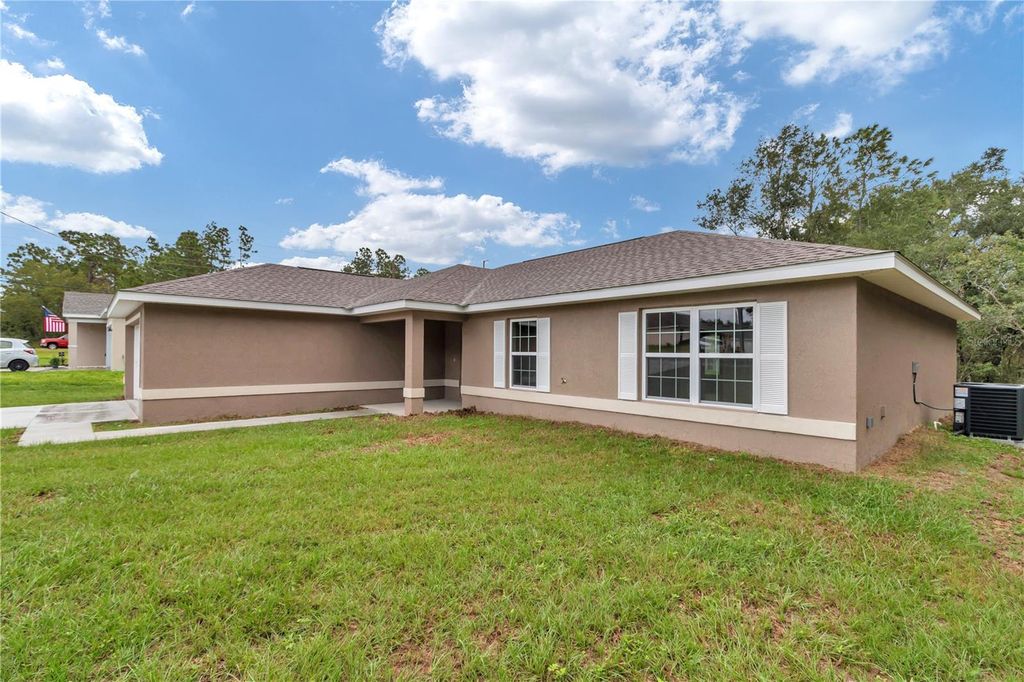 Photo of 3775 SE 132nd Place, Belleview, FL 34420 (MLS # OM711531)