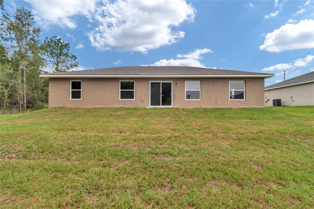 Photo of 3775 SE 132nd Place, Belleview, FL 34420 (MLS # OM711531)