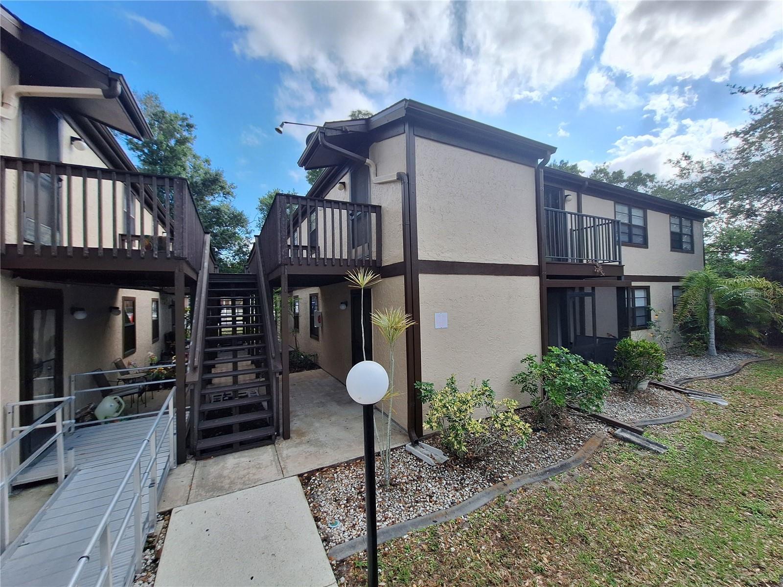 Second Floor totally remodeled condominium in the 55+ community of Cedar Woods. This extraordinarily modernized 2 bedroom, 2 bathroom condo is your perfect Southwest Florida residence! Gorgeously upgraded kitchen includes stainless steel appliances and granite countertops with a unique island style pass through to the dining area. Living room is complete with TV, couch and mini bar. Master bedroom has an ensuite bathroom with a walk-in shower. Enjoy a relaxing drink on the deck overlooking the backyard. Laundry room is inside the unit. Tired of mosquitoes destroying quality pool time? Not a problem in Cedar Woods fully screened in, heated community pool! Close to hospitals and shopping and fishing/boating/water activities in Charlotte Harbor. NO PETS ALLOWED according to association rules. Come see this lovely Condo today! Association requires 20 days for approval.
