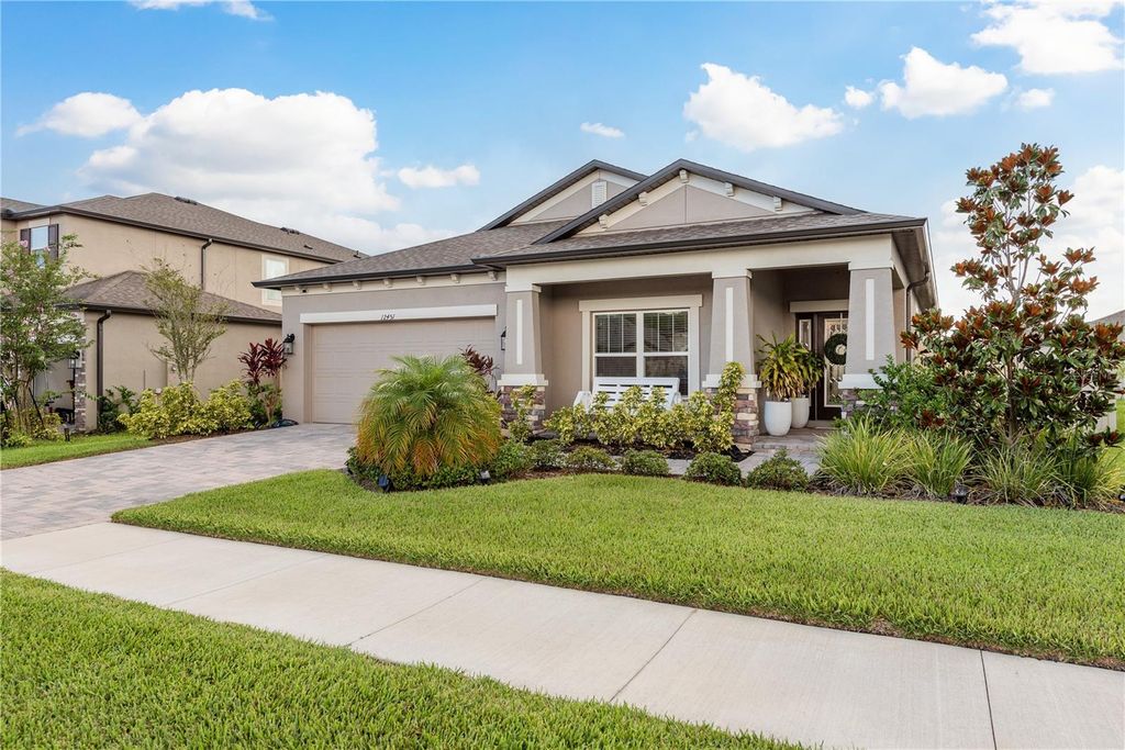 Photo of 12451 Nouveau Avenue, Spring Hill, FL 34610 (MLS # TB8397026)