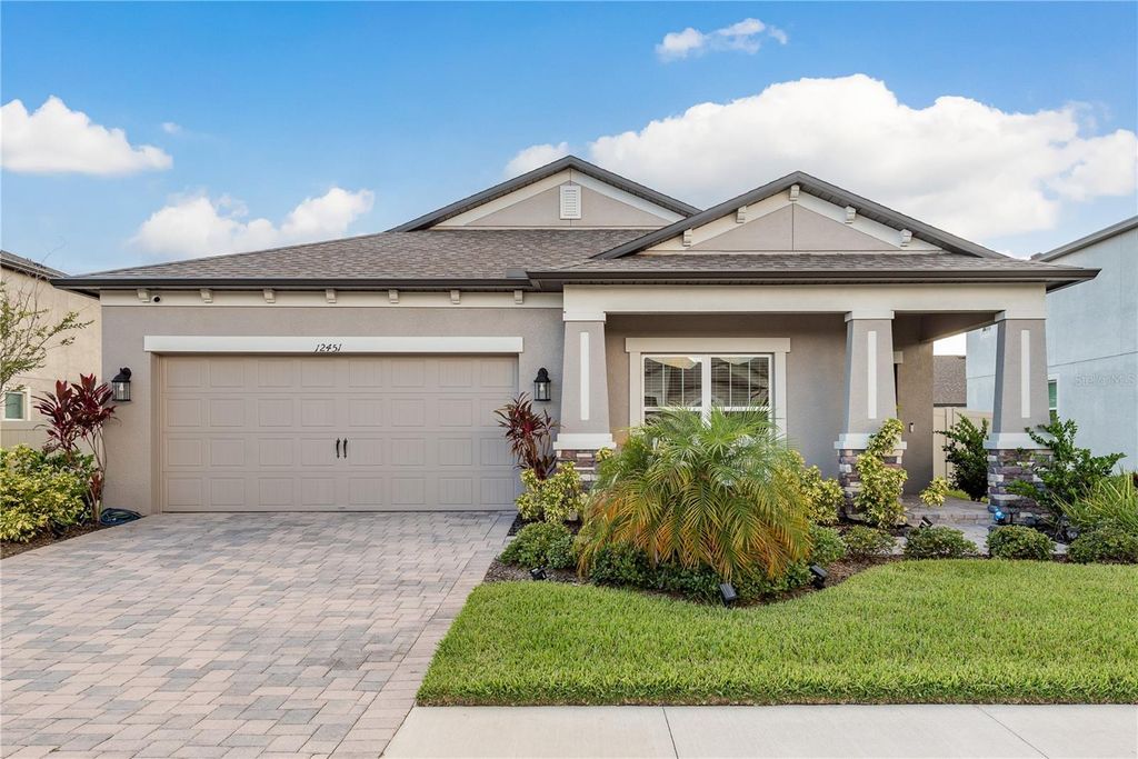 Photo of 12451 Nouveau Avenue, Spring Hill, FL 34610 (MLS # TB8397026)