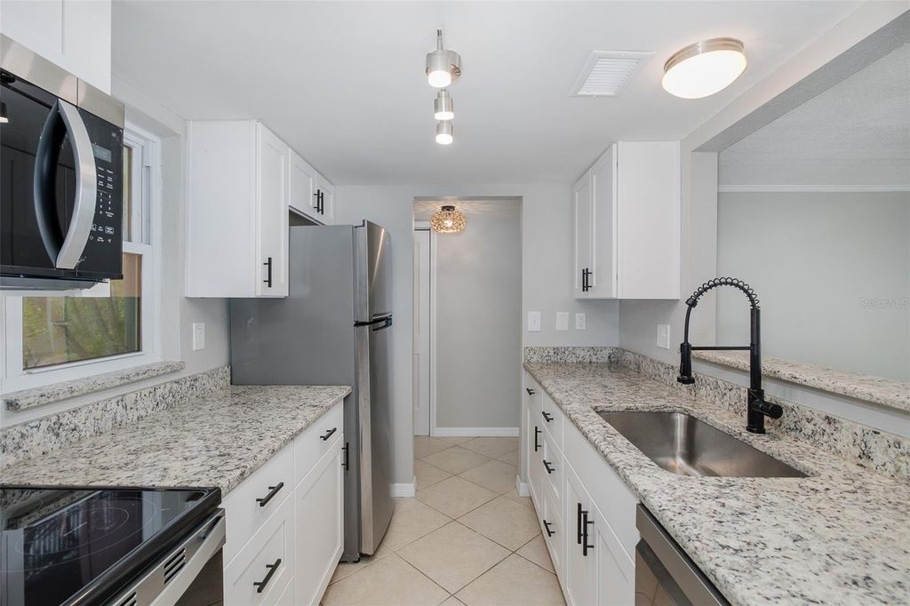 Photo of 464 N Paula Drive #106, Dunedin, FL 34698 (MLS # W7884585)