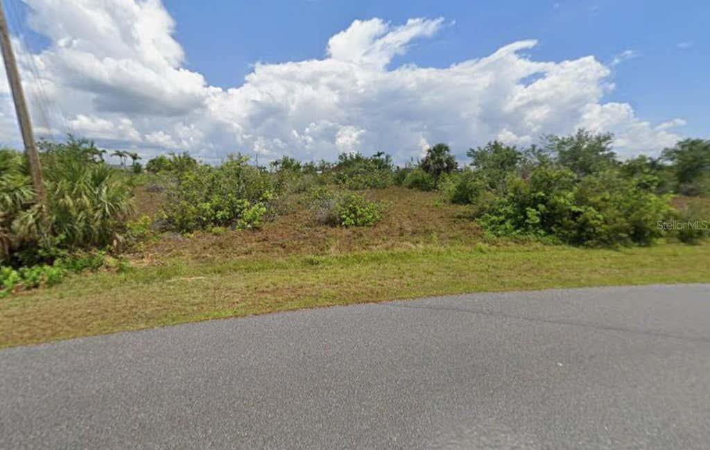 Photo of 15699 Ruston Circle, Port Charlotte, FL 33981 (MLS # C7528919)