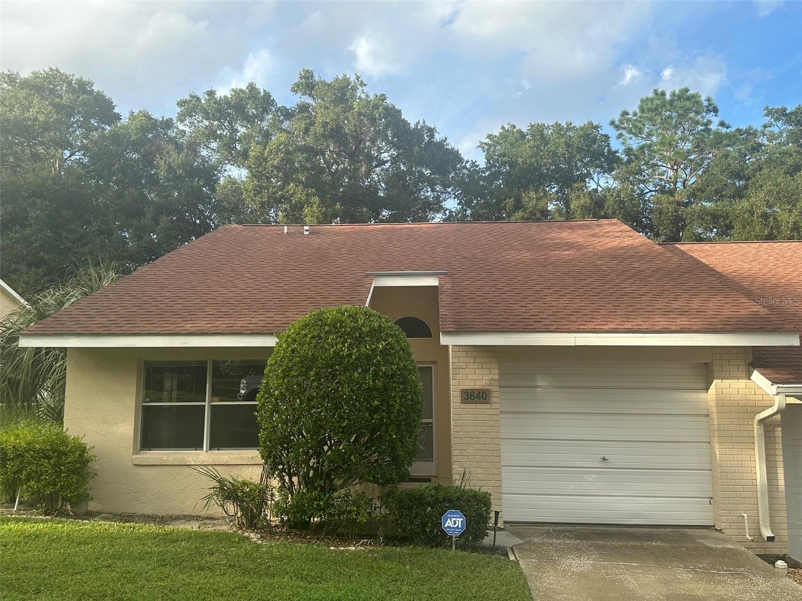 Check out this charming 2/2/1 in the 55+ community of the Glen! This split plan villa boasts a cathedral ceiling, upgraded tile and laminate flooring, kitchen passthrough, and rear screened lanai. Monthly HOA fees include water, sewer, trash, wifi, and yard maintenance. New roof in 2016. Call today to schedule a showing!