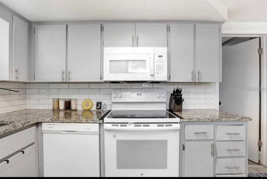 Photo of 9040 Lunar Lane, Port Richey, FL 34668 (MLS # TB8470884)