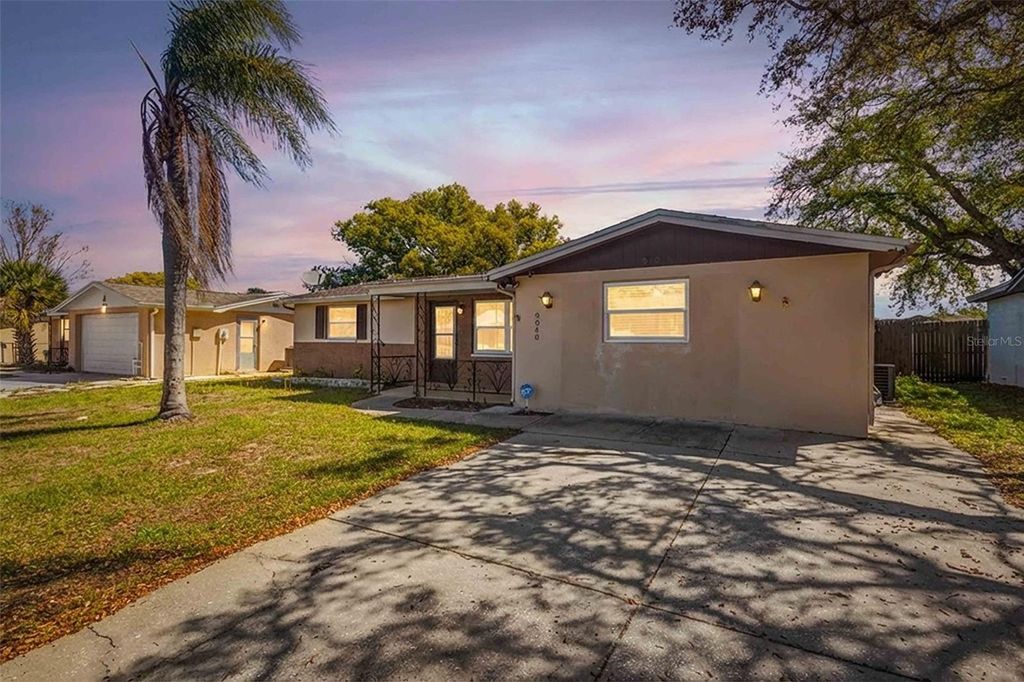 Photo of 9040 Lunar Lane, Port Richey, FL 34668 (MLS # TB8470884)