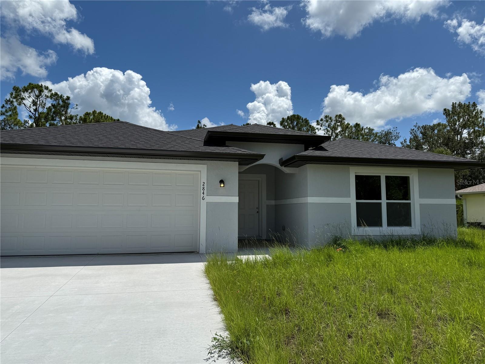 Available immediately for annual rent in North Port, this brand-new home built in 2025 has never been lived in. It features 4BR 2BA, and nearly 1,800 square feet of living space. The open-concept design includes a spacious kitchen with a large island, perfect for entertaining. Situated on a 10,000-square-foot lot, the property offers ample outdoor space while being conveniently located near I-75. Additional features include a laundry closet and a two-car attached garage. Credit and background checks are required. First month, last month and a security deposit are due prior to move-in. Pets are considered on a case-by-case basis.