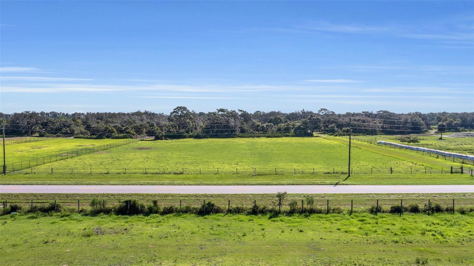 Desirable Canoe Creek Road, 5.6 acres of majestic live oaks and gently rolling improved pasture in Saint Cloud, FL. Numerous potential homesites throughout in the oak hammock and in the cleared pasture. No HOA, no deed restrictions and no builder requirements will allow you to select your builder and construct the home of your dreams! The property's zoning allows for many uses, including horses, livestock and parking for your large truck or semi. Potential for a future lot split into two parcels. Only 10 minutes to Publix and other shopping destinations and 15 minutes to the Florida Turnpike. Do not miss this rare opportunity.