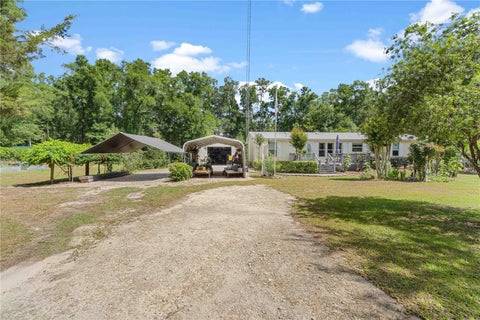 Photo of 4050 NE 172nd Court, Williston, FL 32696 (MLS # OM724630)