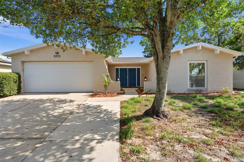 Photo of 8233 Redfield Drive, Port Richey, FL 34668 (MLS # W7887147)