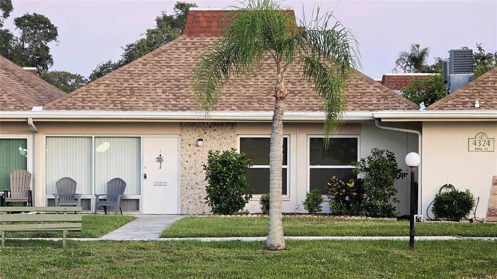 Photo of 4324 Tahitian Gardens Circle #J, Holiday, FL 34691 (MLS # TB8391715)