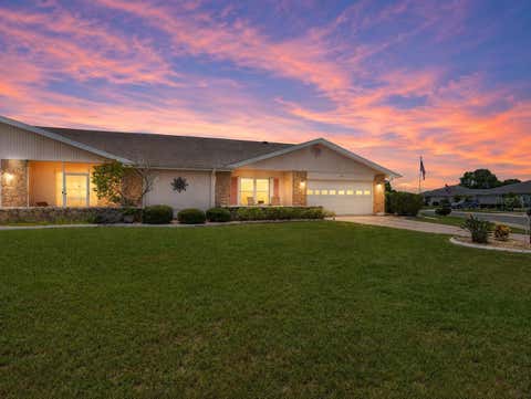 Photo of 907 Bluewater Drive, Sun City Center, FL 33573 (MLS # TB8533224)