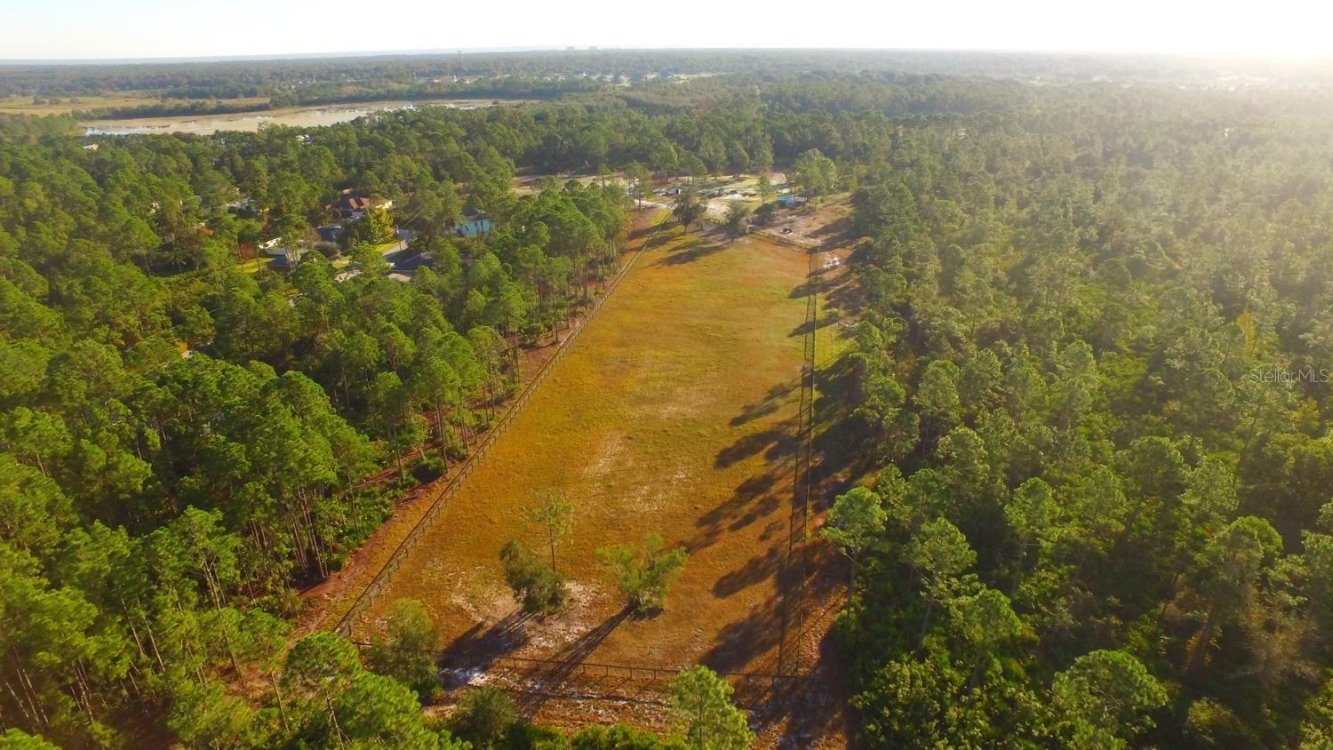 PRICE IMPROVEMENT!! SELLER SAYS MAKE US AN OFFER!! SEMINOLE WOODS RANCH FOR SALE. 10.88 ACRES
Units 1 and 2 are being sold together.
Discover your dream property with this exceptional opportunity to own a prime parcel of
real estate in the sought-after Seminole Woods area. This 10.88-acre site offers expansive,
high and dry land that is cleared and ready for your vision. Whether you aim to develop,
invest, or build your dream estate, this property offers unparalleled potential. Currently
operating as a horse boarding ranch, it’s ready for its next chapter.
*LOCATION: Situated in a highly desirable area with convenient access to major roads and
amenities.*
*VERSATILITY: Perfect for residential development, agricultural use, or creating a custom
estate.*
*UTILITIES: Ready for connection to essential utilities, simplifying the development process.*
*LANDSCAPE: Serene and open landscape, offering a blank canvas for your dreams.*
WHY THIS PROPERTY?
PRIME REAL ESTATE: Rarely does such a substantial piece of land become available in this
sought-after location.
Ready for Development: With the land already cleared and high and dry, you can begin your
project with minimal preparation.
Ideal Location: Enjoy the best of both worlds—tranquility and easy access to modern
conveniences.
Explore the endless possibilities this property offers and make your vision a reality. Seize the Growth Opportunities in the Seminole Woods Area!