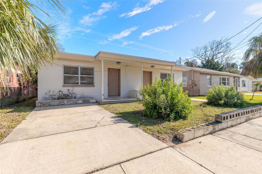 Previously a duplex. Owners converted the property into a 4 bedroom 2 full bathroom home. Can easily be converted back to a duplex if desired with adding 1 wall and putting a kitchen in unit B to make two 2/1 apartments with 600 sq ft each. Property features LVP flooring throughout making the home feel light and bright. Kitchen encompasses white shaker cabinets and white appliances. Massive back porch over looking your oversized backyard! Perfect opportunity for a large family or an investor looking to add this gem to their portfolio.