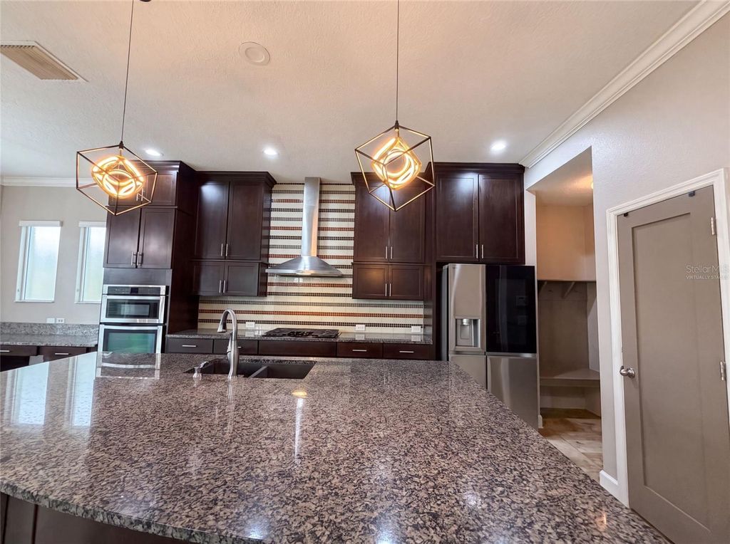 Photo of 7304 Milestone Drive, Apollo Beach, FL 33572 (MLS # O6428345)