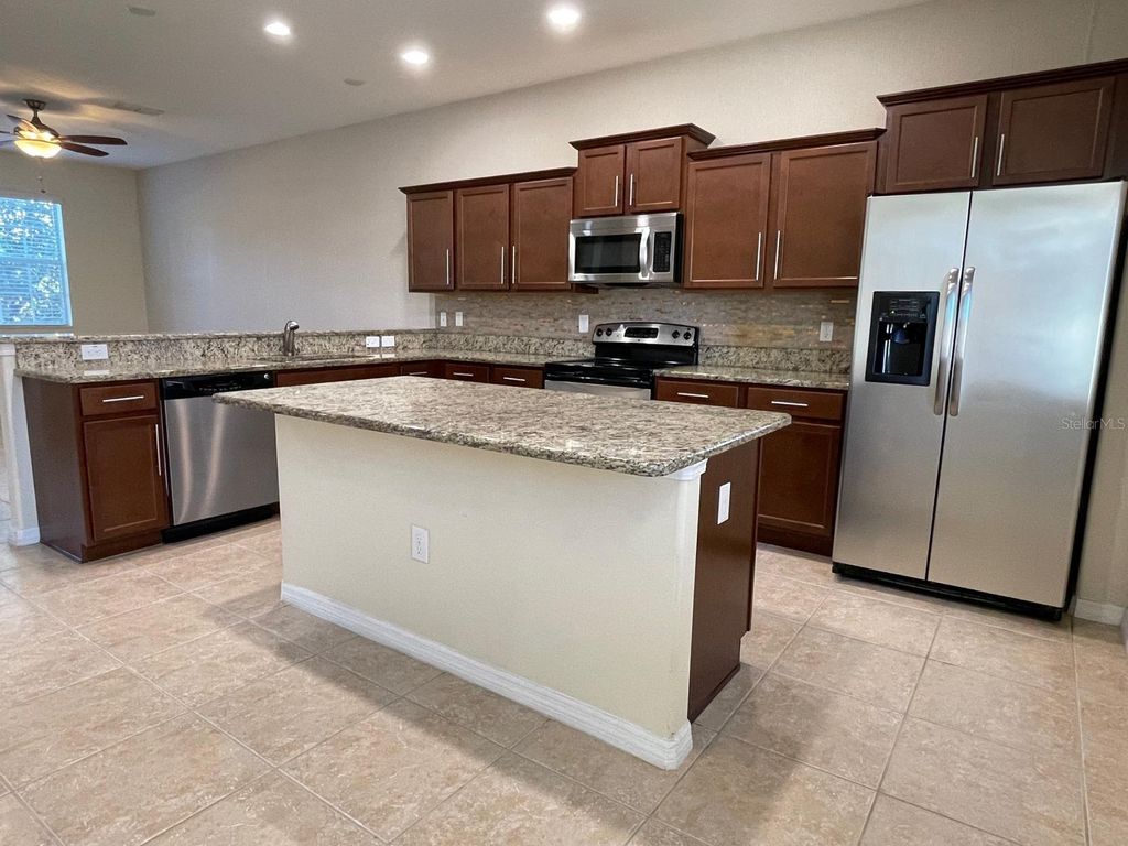 Photo of 9008 Savannah Magnolia Lane, Orlando, FL 32832 (MLS # S5139889)