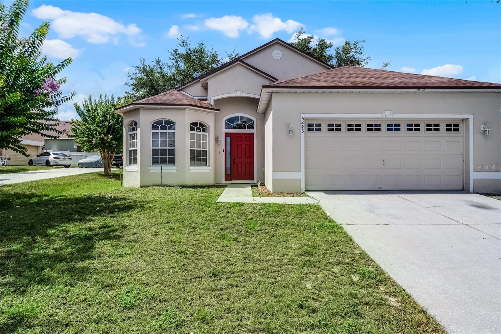 Welcome to this well-maintained 3-bedroom, 2-bathroom home on a great lot in a beautiful community in west Orlando. Featuring a thoughtfully designed split floorplan, this home offers both comfort and functionality for today’s modern lifestyle. Step inside to discover an open-concept living and dining area, perfect for entertaining or relaxing with family. The kitchen offers solid wood shaker cabinets, granite countertops, a spacious pantry, and plenty of prep space. The primary suite offers a peaceful retreat with its walk-in closet and private ensuite bath complete with dual granite vanity sinks and a walk-in shower. Two additional bedrooms—equal in size—share a stylish guest bathroom featuring granite counters and a tub/shower combo. Enjoy natural light throughout the home, especially from the charming bay window at the front. French doors from the family room lead out to a screened-in lanai, ideal for enjoying Florida’s year-round sunshine. Conveniently located just minutes from local restaurants, shopping, and major roadways, this move-in ready home is the perfect blend of style, comfort, and location.